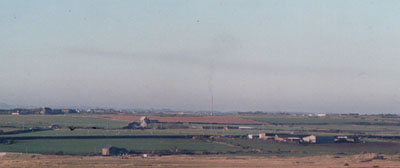 In unusual weather  on 13 January 2001 smoke from the 400ft stack (near centre of photo) at Anglesey Aluminium lingering over NW Anglesey. Photo: &copy; 2001 D. Perkins