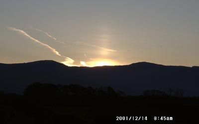 Sun pillar photographed  at 0845 GMTon 14 December 2001. &copy; D Perkins.