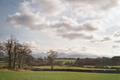 View from Llandsadwrn towards Snowdonia at 1415 GMT on 8 Feb 2001: Photo &copy; D Perkins.