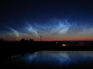Noctilucent clouds seen from Anglesey between 0240 -0340 GMT on 28 July 2001. Photo: Courtesy of &copy; John Rowlands.